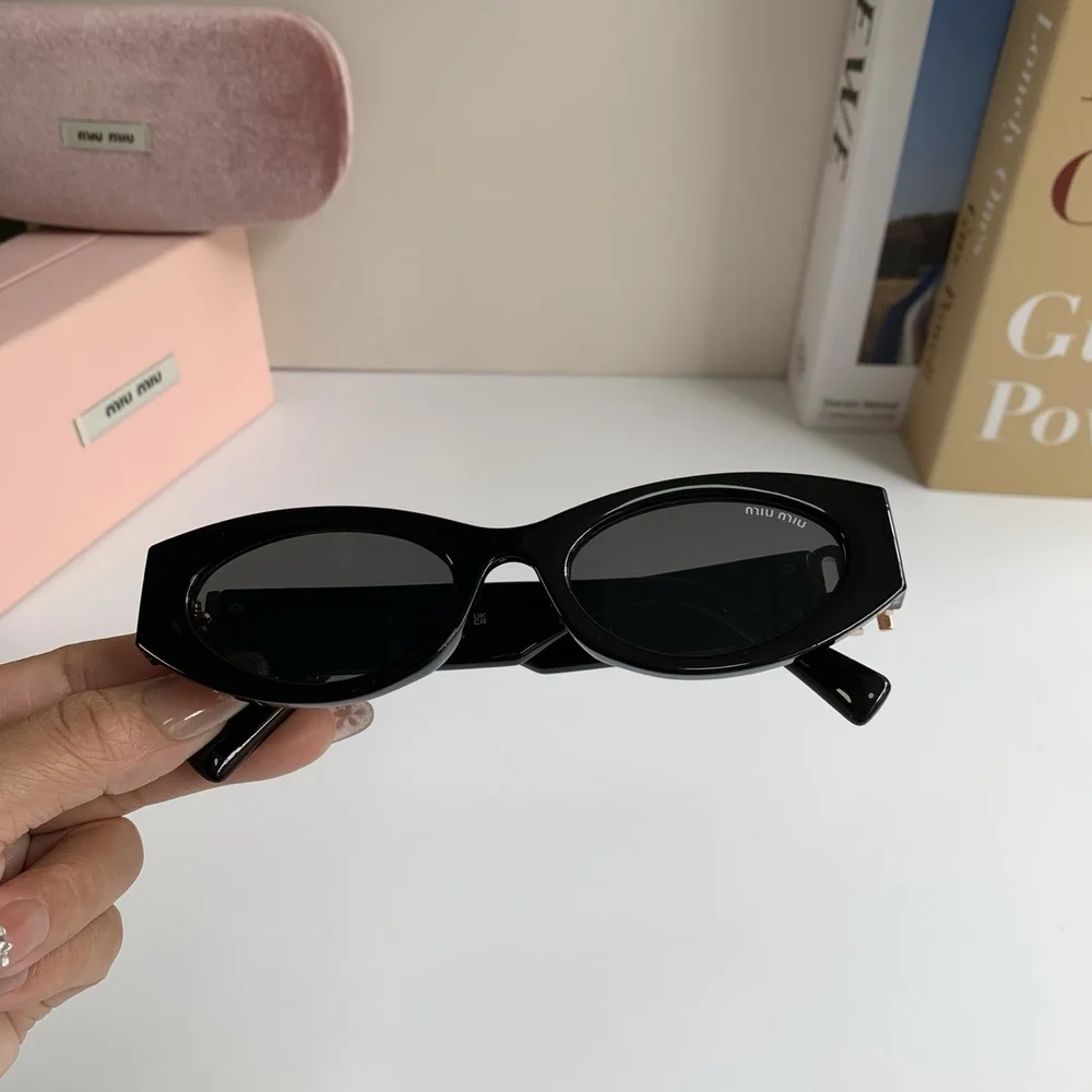 Miu Miu black sun protection sunglasses and aviator sunglasses
